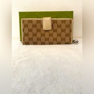 Authentic Gucci GG Canvas Bi-Fold Leather Wallet